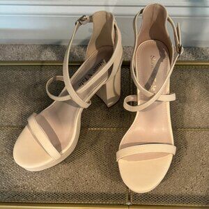 SHOE 'N TALE PLATFORM HEELS